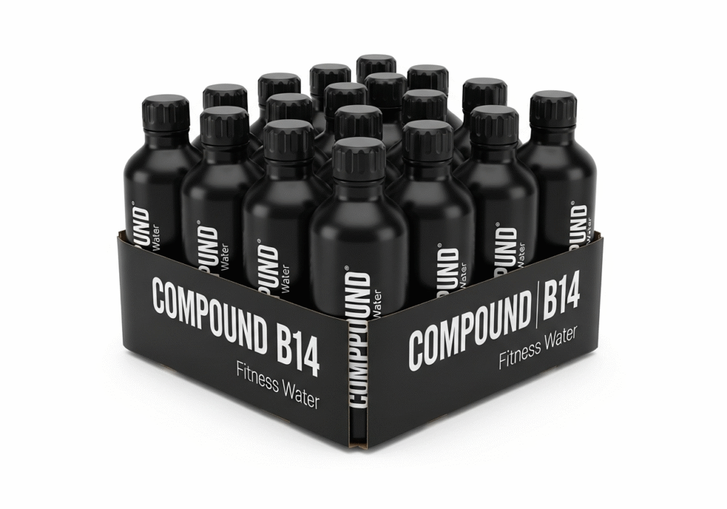Home A display of 24 black bottles of Compound B14 fitness water arranged in a cardboard case